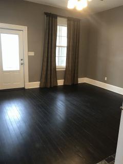LIVING ROOM WITH WALK OUT TO THE FRONT PORCH