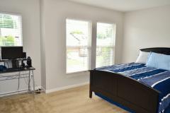 Bedroom 1 has a lot of windows and a large double closet. The square footage will impress.