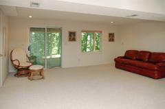 Lower Level, with walk out and half bath. Spacious storage on this level as well.
