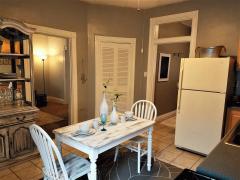 Really spacious eat - in kitchen features nice cabinetry and plenty of counter space. All appliances stay!