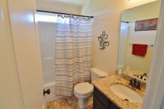 You'll love the Designer Ceramic Tile * Deep Toned Cabinets * Oil Rubbed Bronze Fixtures!
