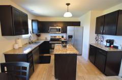 Kitchen Area Opens to the Breakfast Nook/Great Room with Double Doors to the Deck & View!