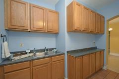 Wooden cabinets just waiting for a facelift.
