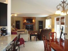 THIS IS A VIEW FROM HALLWAY INTO DINING AND GREAT ROOM AREA*GREAT TRAFFIC FLOW