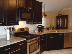 PEEK INTO THIS UPDATED AWESOME KITCHEN*CERAMIC TILE FLOOR*GRANITE TOPS*ALL SS APPLIANCES INCLUDED IN SALE*LIGHTS UNDER CABINETRY*SELF CLOSING CABINETRY*UPDATED PLUMBING FIXTURES*SOAP DISPENSER*CEILING FAN*RECESSED LIGHTS*GAS RANGE