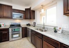 Beautiful wood cabinets and neutral countertops