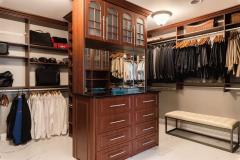 The generous master closet features heated floors and generous built-ins by California Closets. View shows only 1/2 the closet!
