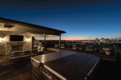 Relax & enjoy - the rooftop terrace offers a covered porch complete with gas fireplace, sound system and flat screen television!