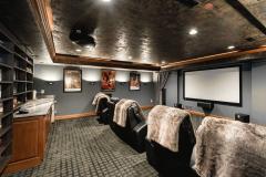 Theatre Room features leather media chairs and a wet bar with upgraded Runco Lightstyle projector with digital HDMI Audio/Video Room Interface and Denon 7.2 Sound Receiver.