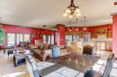 Enormous Hearth room with Stone wood burning Fireplace and Heated Tile Floors