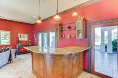 Adjacent to the Kitchen and Hearth room is the built in wet bar great space for all your beverages