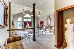Beautiful Detailed Rod Iron rails and Vaulted Ceilings