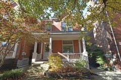 Gorgeous brick home with off street parking, a large covered front porch and a view of one of the best neighborhoods in town...Mansion Hill.