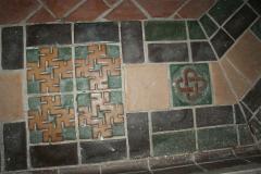 Off of the Family Room and Dining Room is Solarium. Plaster was removed from walls due to damage from roof leak. The floor is this beautiful Rookwood Tile.