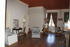 Third floor has huge Family Room/Rec Room, 2 additional bedrooms and a full bath. Notice the Rookwood Fireplace.