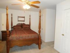 Bedroom 2 with two closets and attic storage
