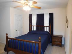 Bedroom 3 with two closets and attic storage