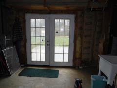 Basement walk out in the storage area/workshop