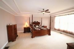 large window to enjoy the view, double tray ceiling, ceiling fan, walk in closet, large master bath.