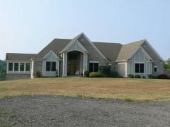 4 bedroom ranch on 5+ acres.