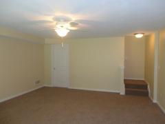 Extra family room in lower level with walkout to patio.