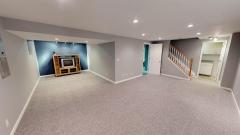 Finished basement has entertaining area, great space for movie night, with over-sized storage room, large workshop, and two large storage closet/small rooms.