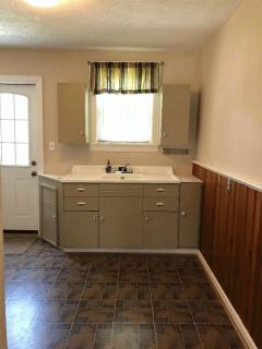 Kitchen with original farm sink