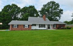 Excellent Income! High Volume Kennel*Room to Substantially Expand (Building in Place)*House has Soaring Knotty Pine Ceilings/Brick Fireplace/Hickory Kitchen*Huge Lower Level w. Fam Rm/Kitchenette/Bar*Full Bath*Lots of Storage*Excellent Location!