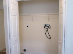 Laundry room area right off kitchen.