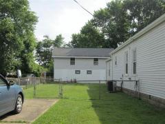 Large double lot with driveway. Great area to play. Fenced in yard!