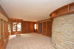Accessible by a very cool spiral staircase you will find the perfect "Mancave" or Woman wine cellar!
