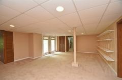 Additional finished lower level space can be used as a playroom or media center