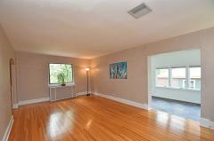 Generous room with rook wood fireplace, to be used as family space or an amazingly, large dining room or billiard room