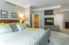 This master bedroom is a show stopper! Two closets, gas fireplace, massive crown molding and ceiting details will keep all the guests curious! Posh wall to wall carpet in the first floor master with gel padding - no expense spared!