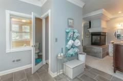 The architectural details abound! Natural light, massive molding, picture perfect color scheme, with every amenity to take this room to the next level!