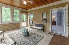 Ceiling detail with ceiling fan keeps summer nights cool and direct access off of the master. What a great place to make memories.