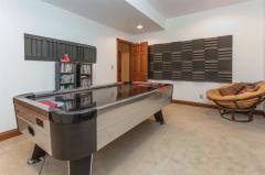 This bonus room the sellers use for air hockey. Lots of possibilities with the extra room in the lower level...