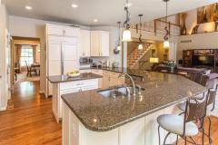 This gorgeous kitchen opens directly into the living room. Easy to entertain guests with this amazing floor plan.