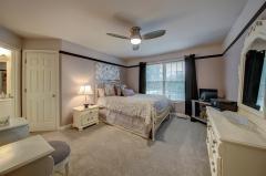 Large master offering see thru fireplace, plant ledge, recessed lighting and speakers. 14x11 sitting room offering recessed lighting and columns.