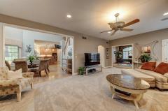 Relax in front of the Stone gas fireplace on those cold winter nights. Lots of windows for plenty of natural lighting and recessed lighting when needed. Walkout to covered balcony offering fan and speakers is perfect for entertaining or just relaxing.