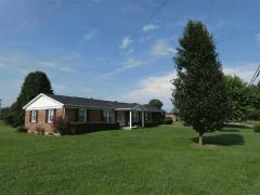 This Brick Ranch Home available with 1 Acre Gorgeous Lot and Barn/ Also available with additional land and mobile home on 70 Holmes Road Separately as MLS # 519161/ This Price Includes Just the Brick Ranch Home and Barn and Approximately 1 Acre/ AWESOME!
