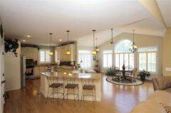 Huge Morning Room Walks-Out to Covered Rear Deck. Beautiful Picture Windows are all Cased with Plantation Shutters.